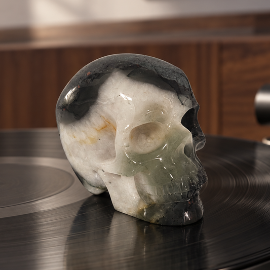 Main view of a 3-inch African Bloodstone human skull carving