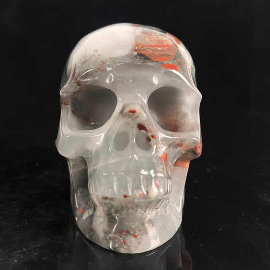 Front view of a 4.5-inch African Bloodstone human skull carving