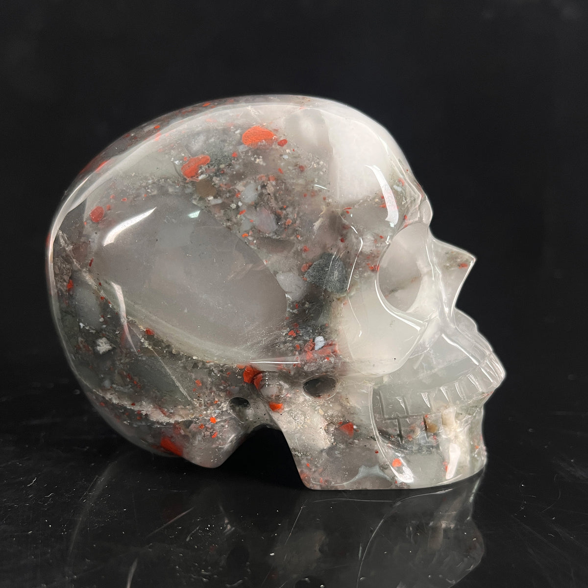 Right view of a 4.5-inch African Bloodstone human skull carving