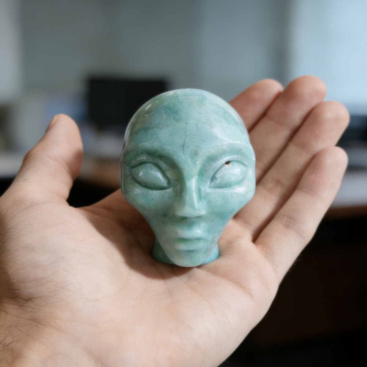 Additional view of a 2-inch Amazonite alien skull carving