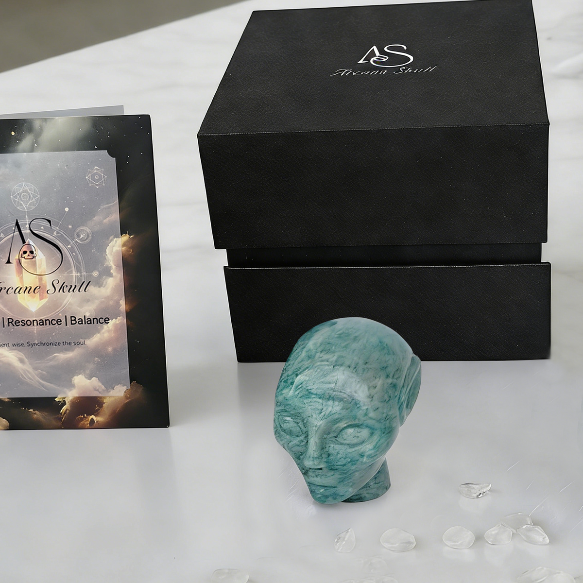 Additional view of a 2-inch Amazonite alien skull carving