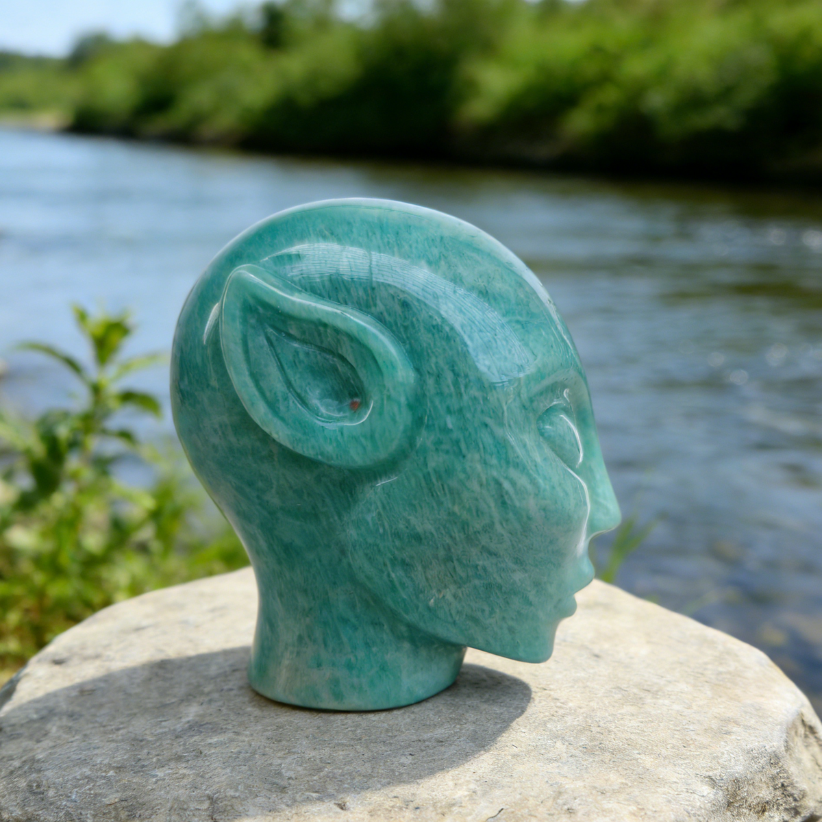 Additional view of a Amazonite alien skull carving