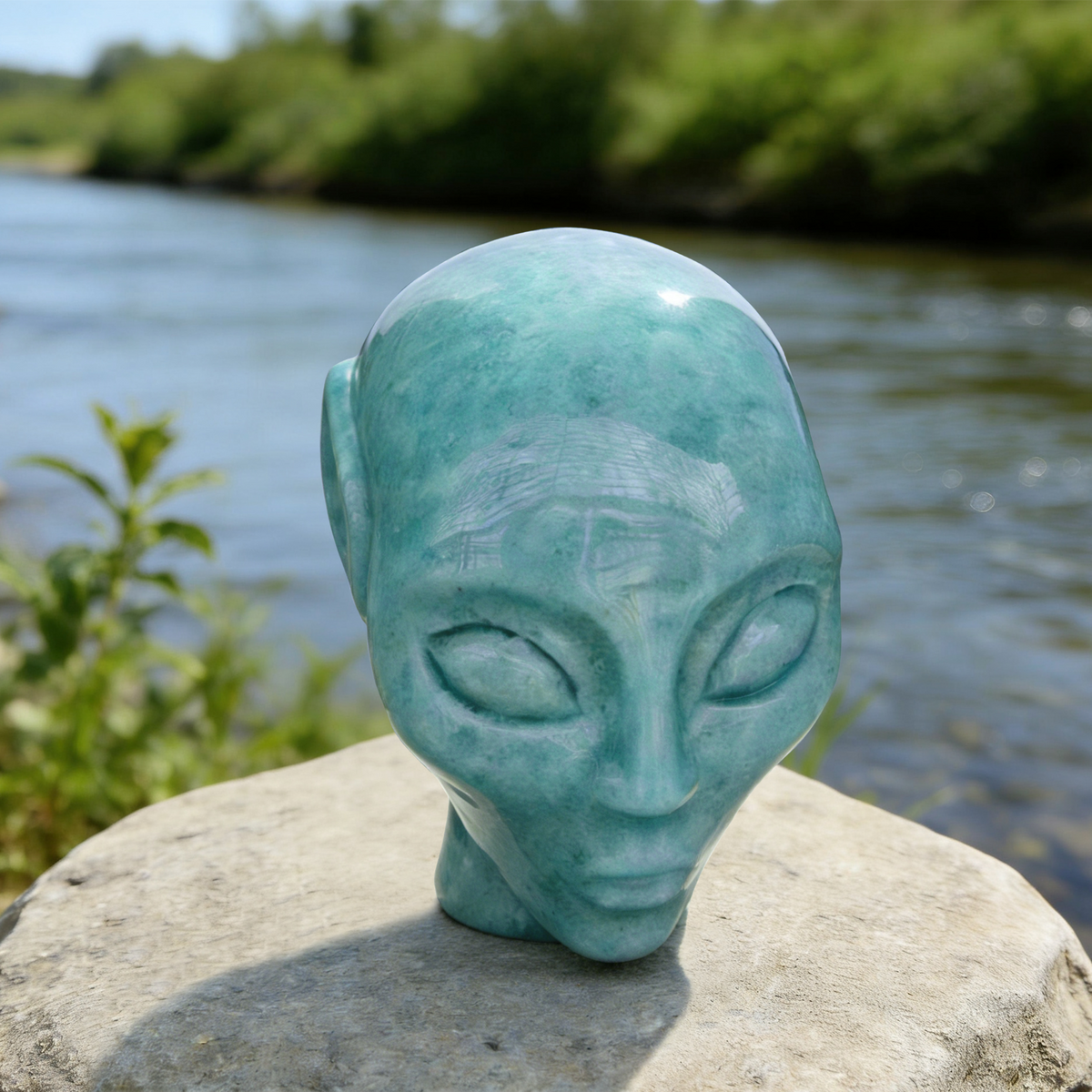 Additional view of a Amazonite alien skull carving