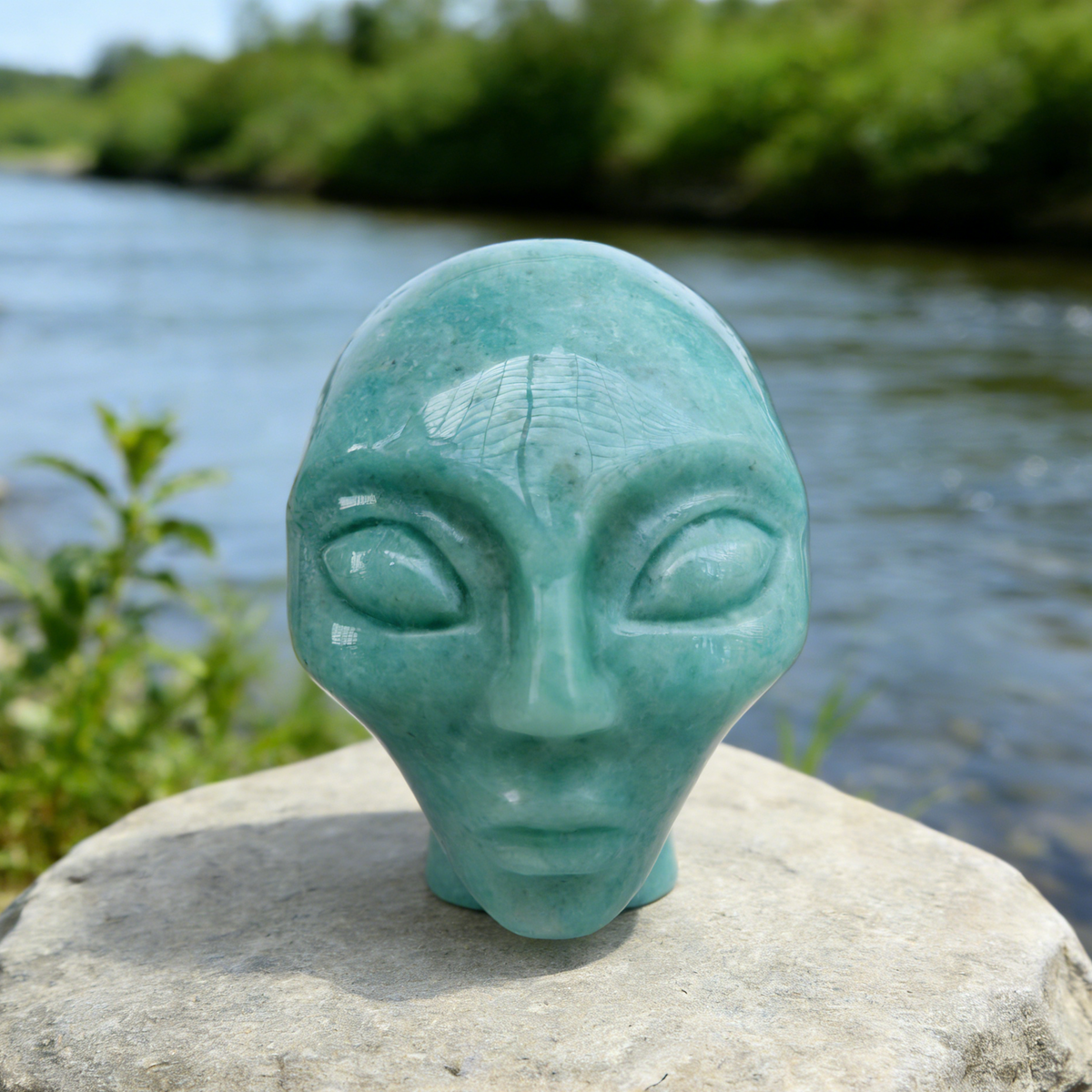 Additional view of a Amazonite alien skull carving