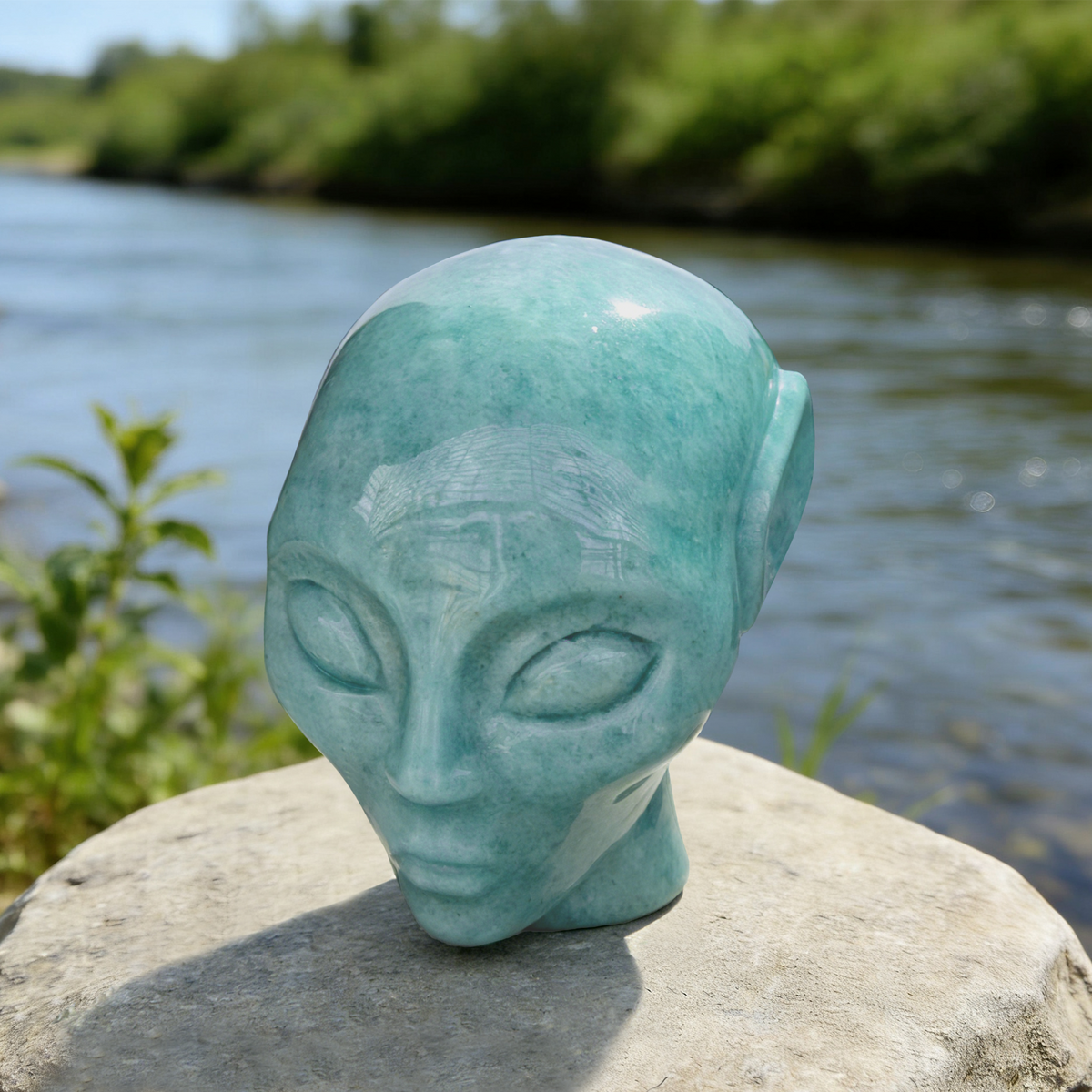 Additional view of a Amazonite alien skull carving