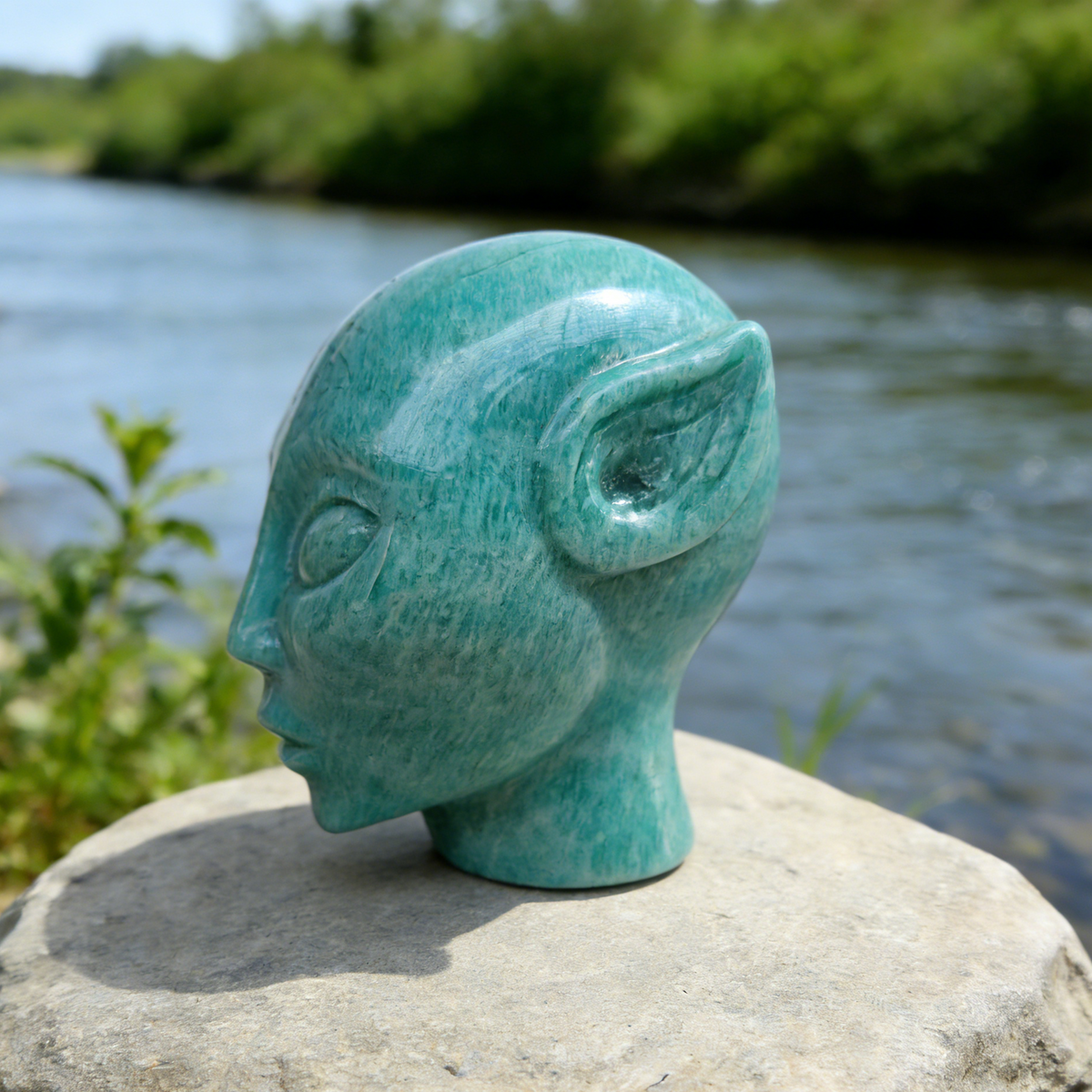 Additional view of a Amazonite alien skull carving