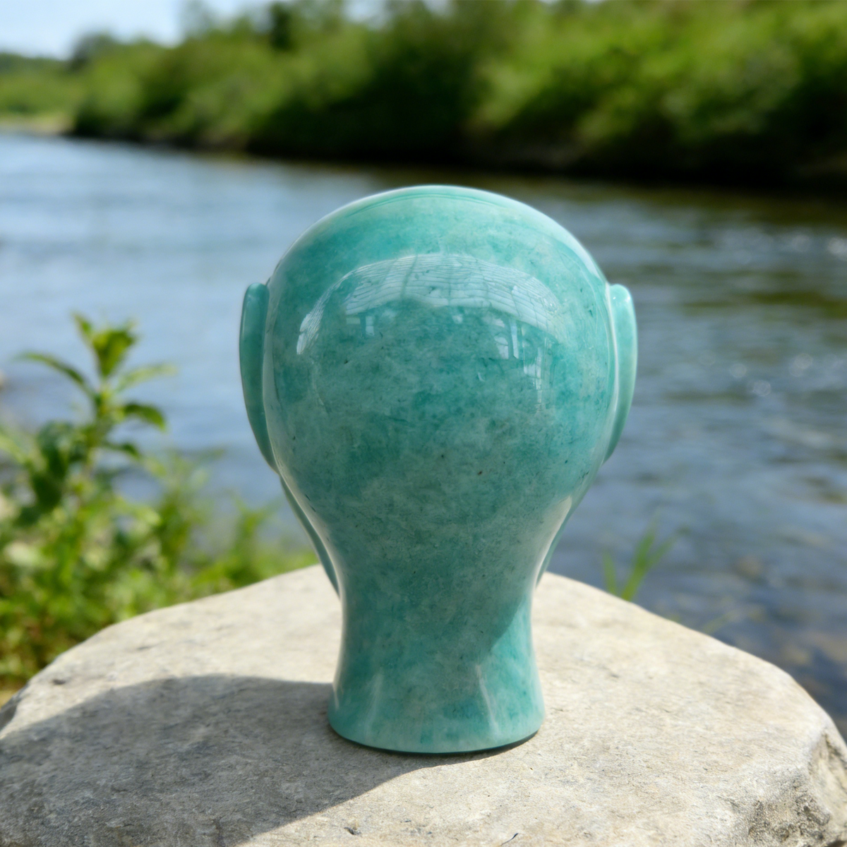 Additional view of a Amazonite alien skull carving