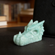 Additional view of a 2.5-inch Amazonite dragon skull carving