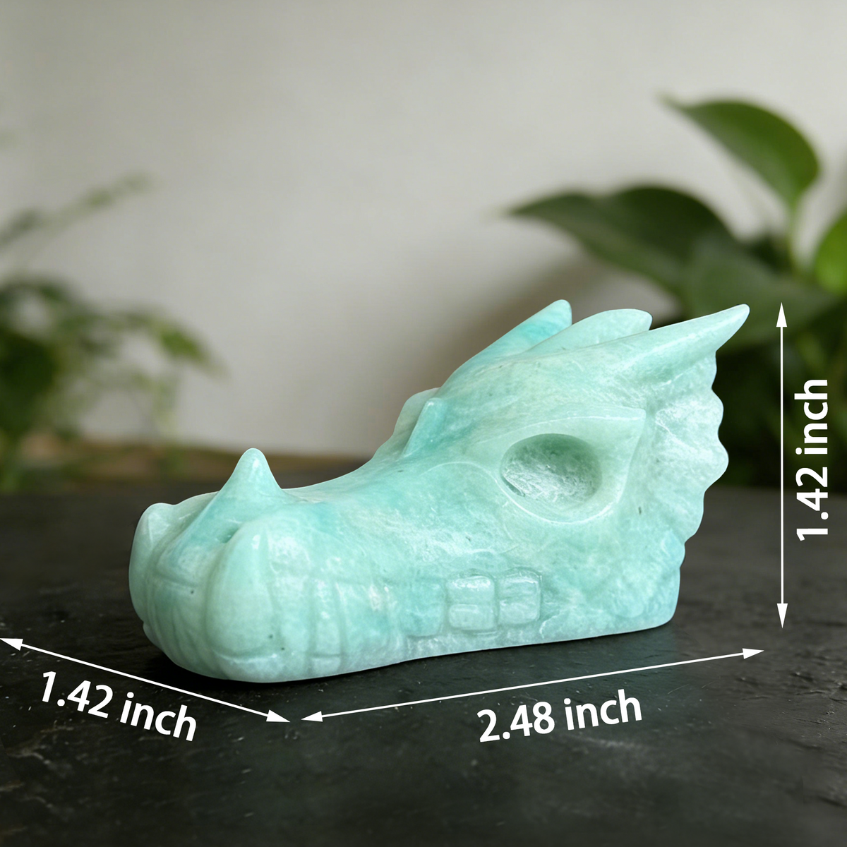 Additional view of a 2.5-inch Amazonite dragon skull carving