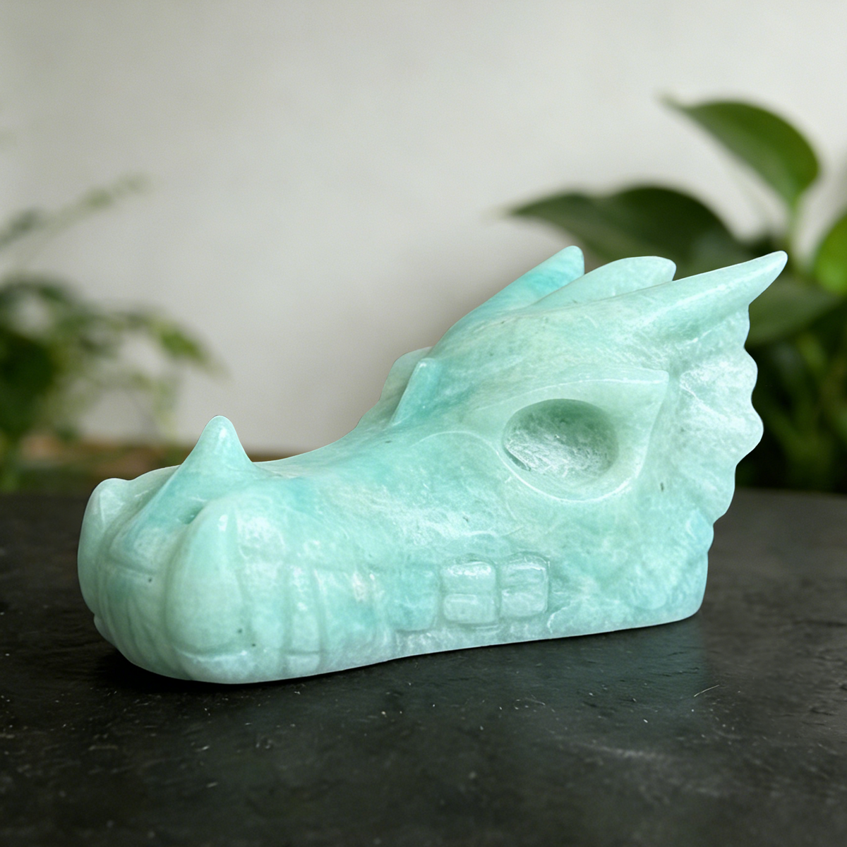 Additional view of a 2.5-inch Amazonite dragon skull carving