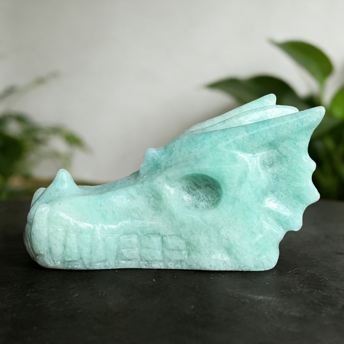 Additional view of a 2.5-inch Amazonite dragon skull carving