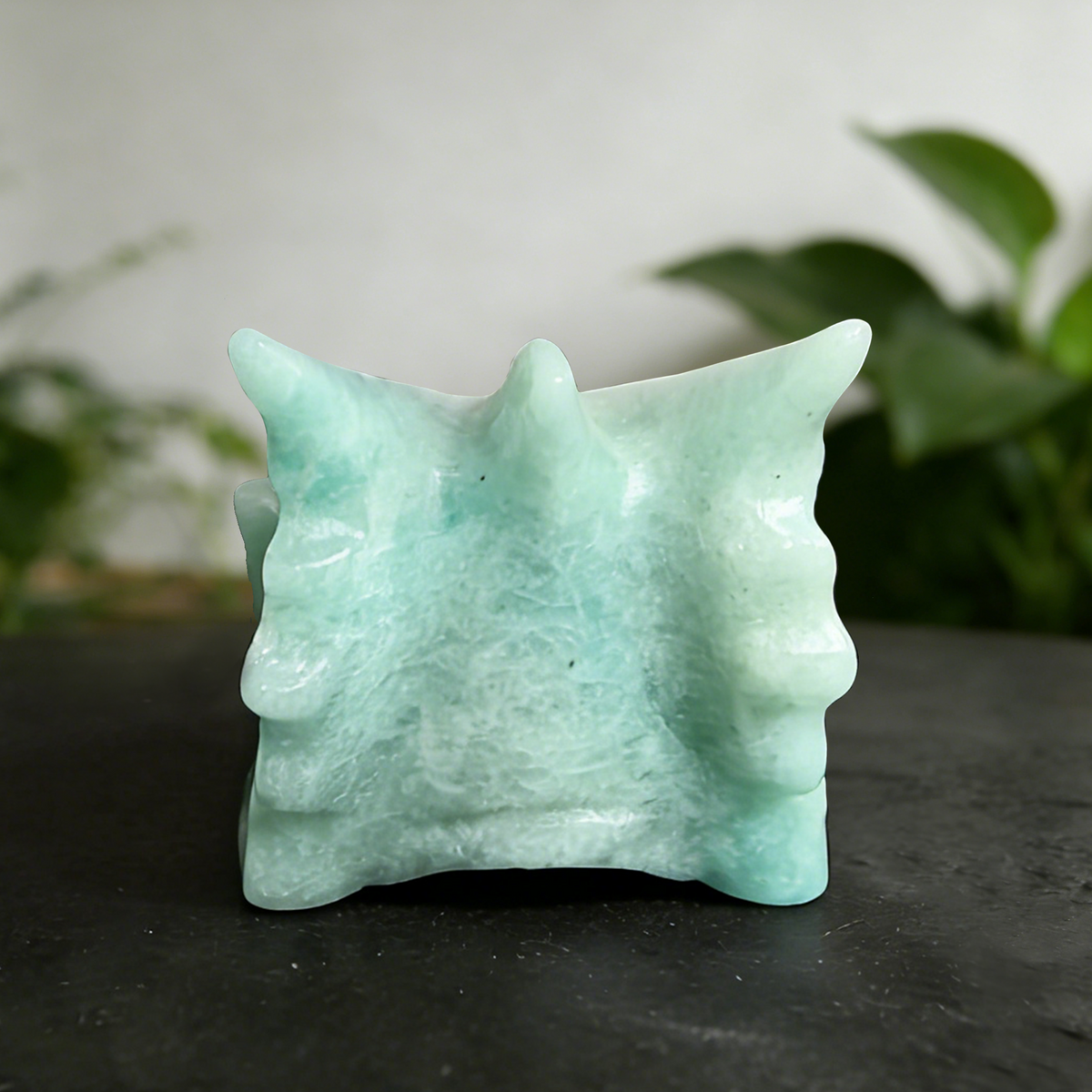 Additional view of a 2.5-inch Amazonite dragon skull carving