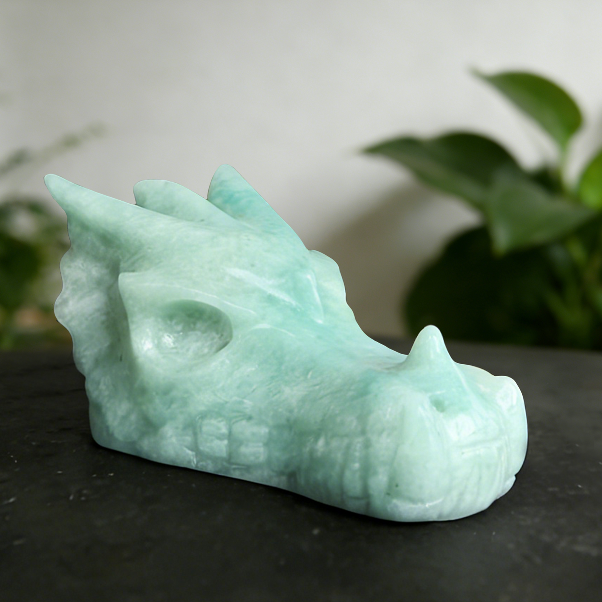 Additional view of a 2.5-inch Amazonite dragon skull carving