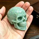 Additional view of a 2-inch Amazonite human skull carving