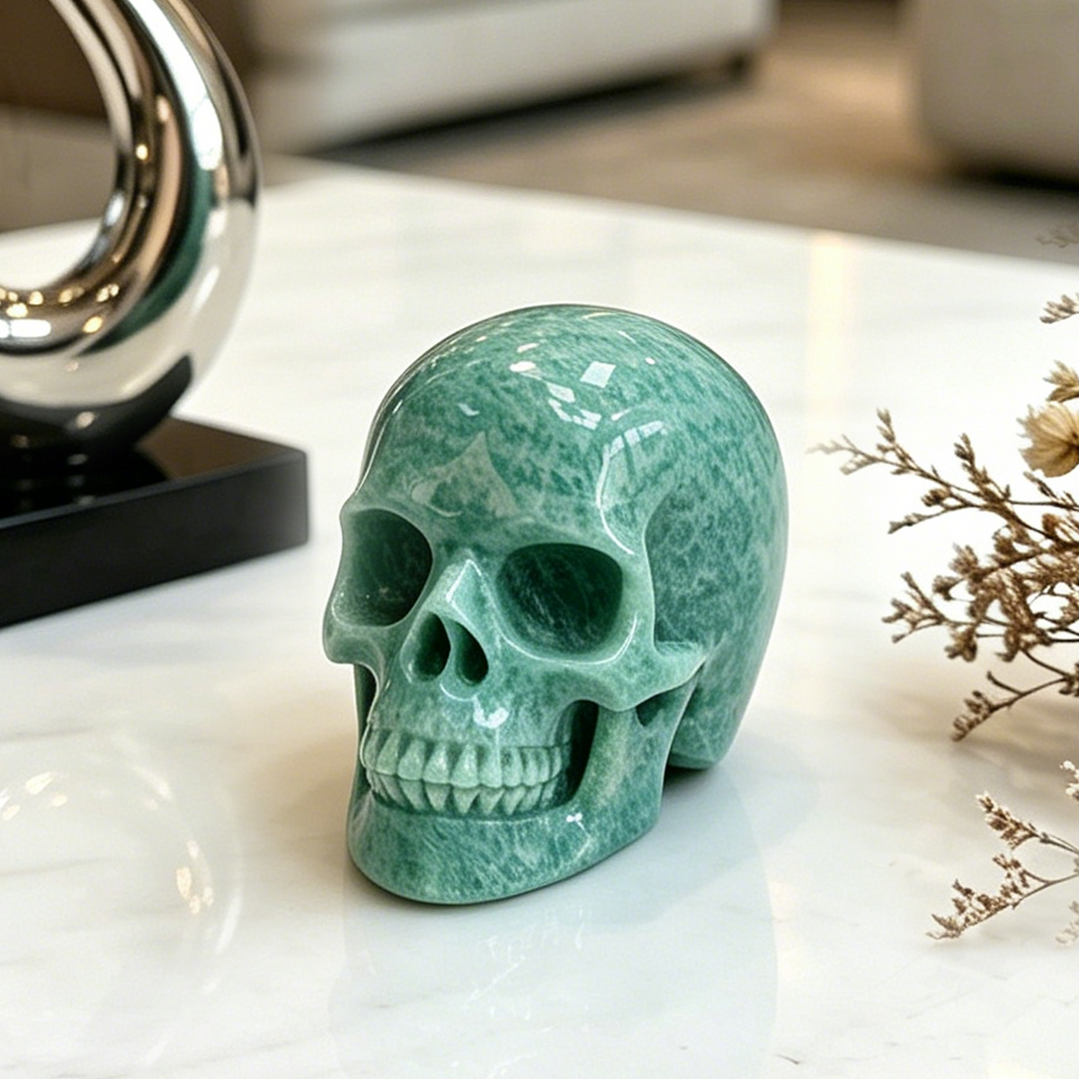 Additional view of a 3-inch Amazonite human skull carving