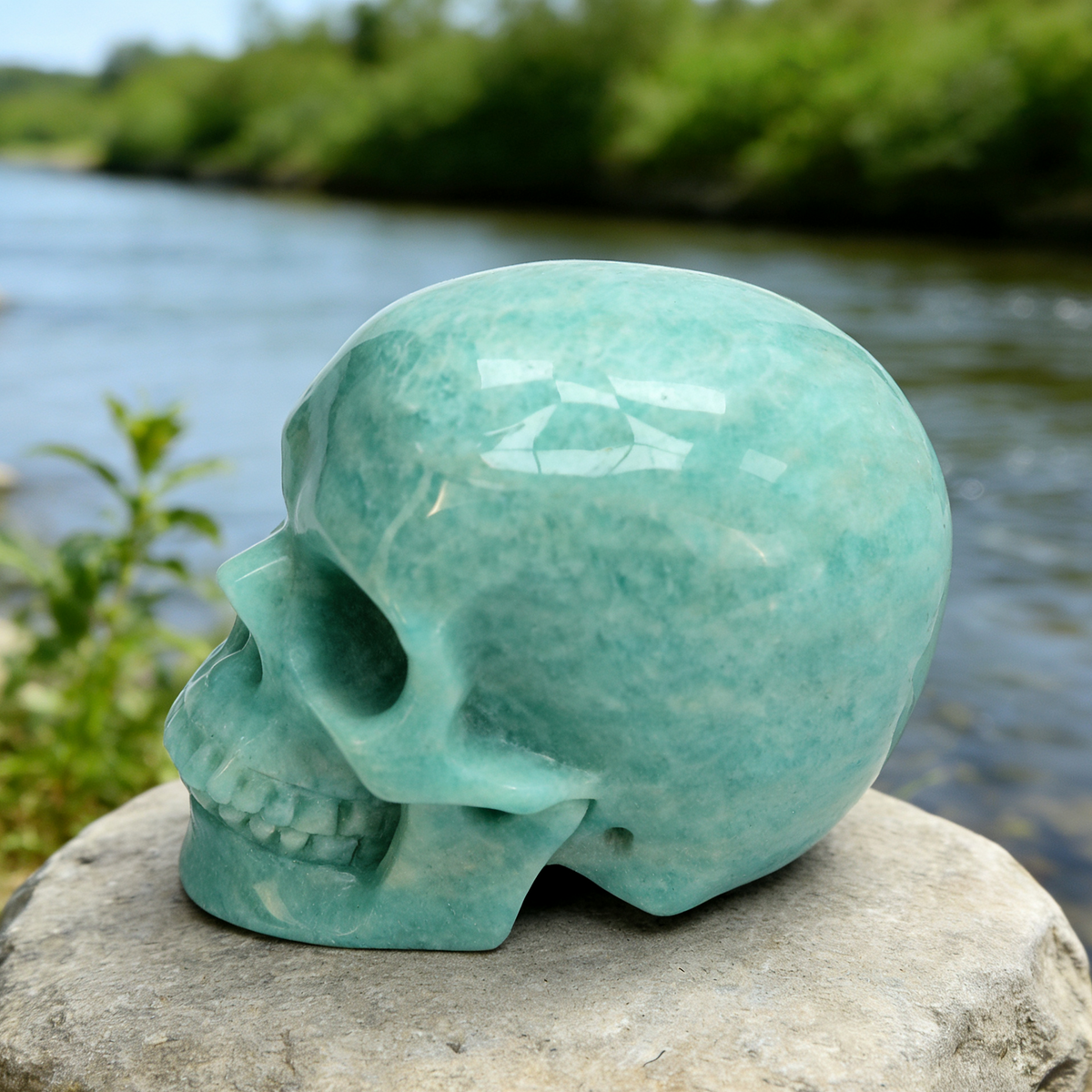 Additional view of a Amazonite human skull carving