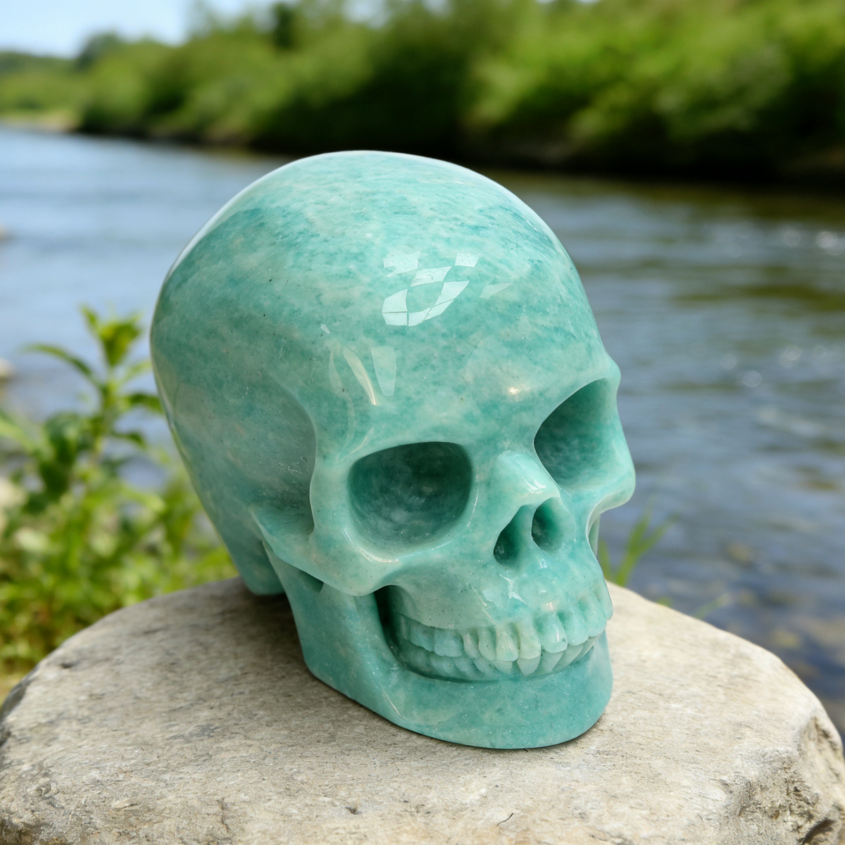 Additional view of a Amazonite human skull carving