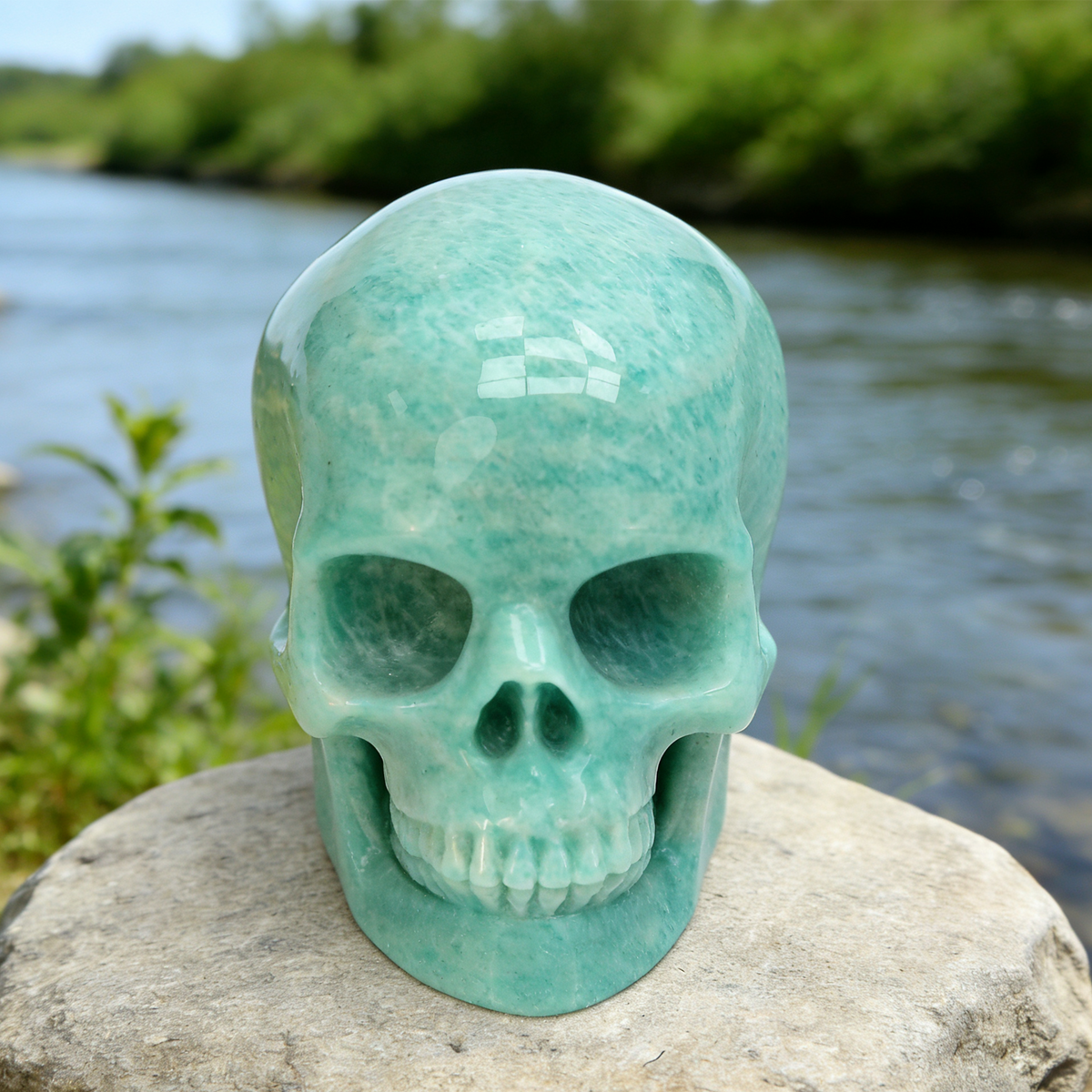 Additional view of a Amazonite human skull carving
