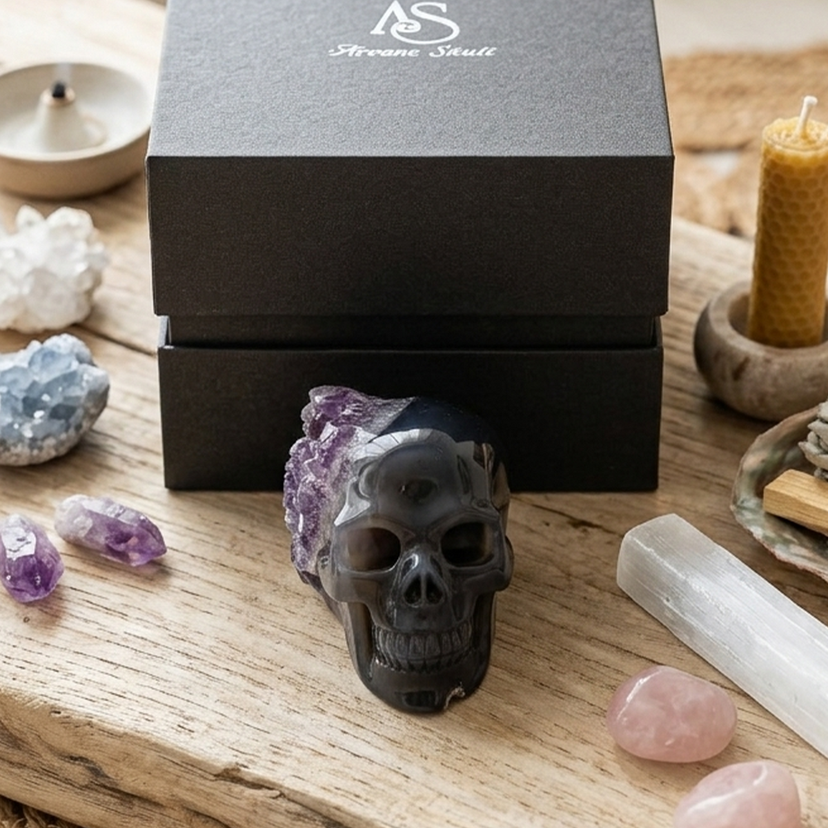 Additional view of a 2.6-inch Amethyst cluster half-face skull carving