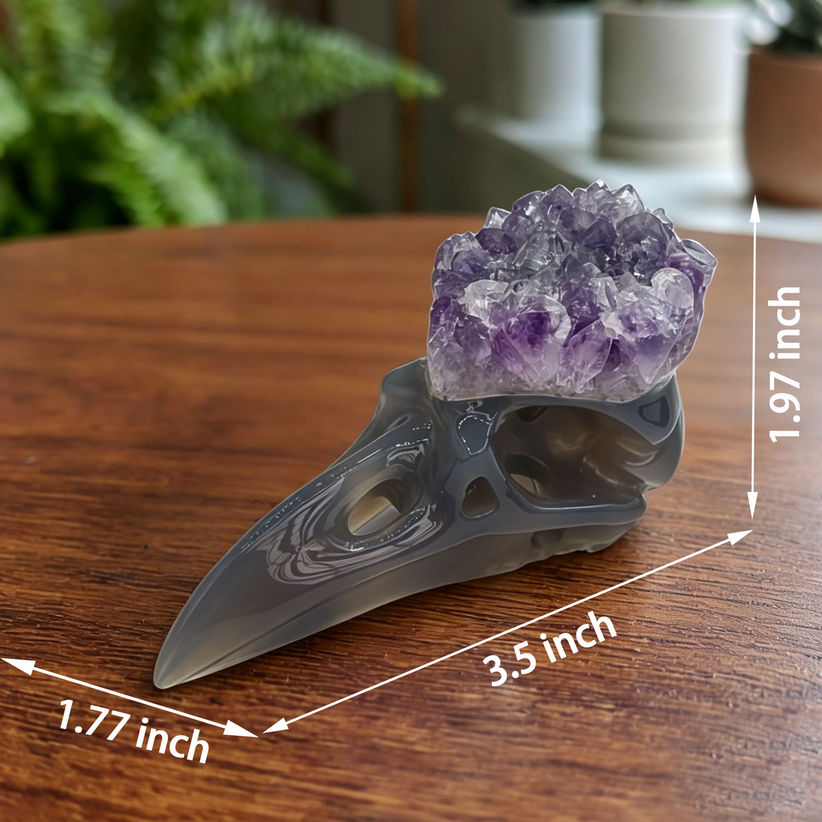 Additional view of a 3.5-inch Amethyst Cluster raven skull carving