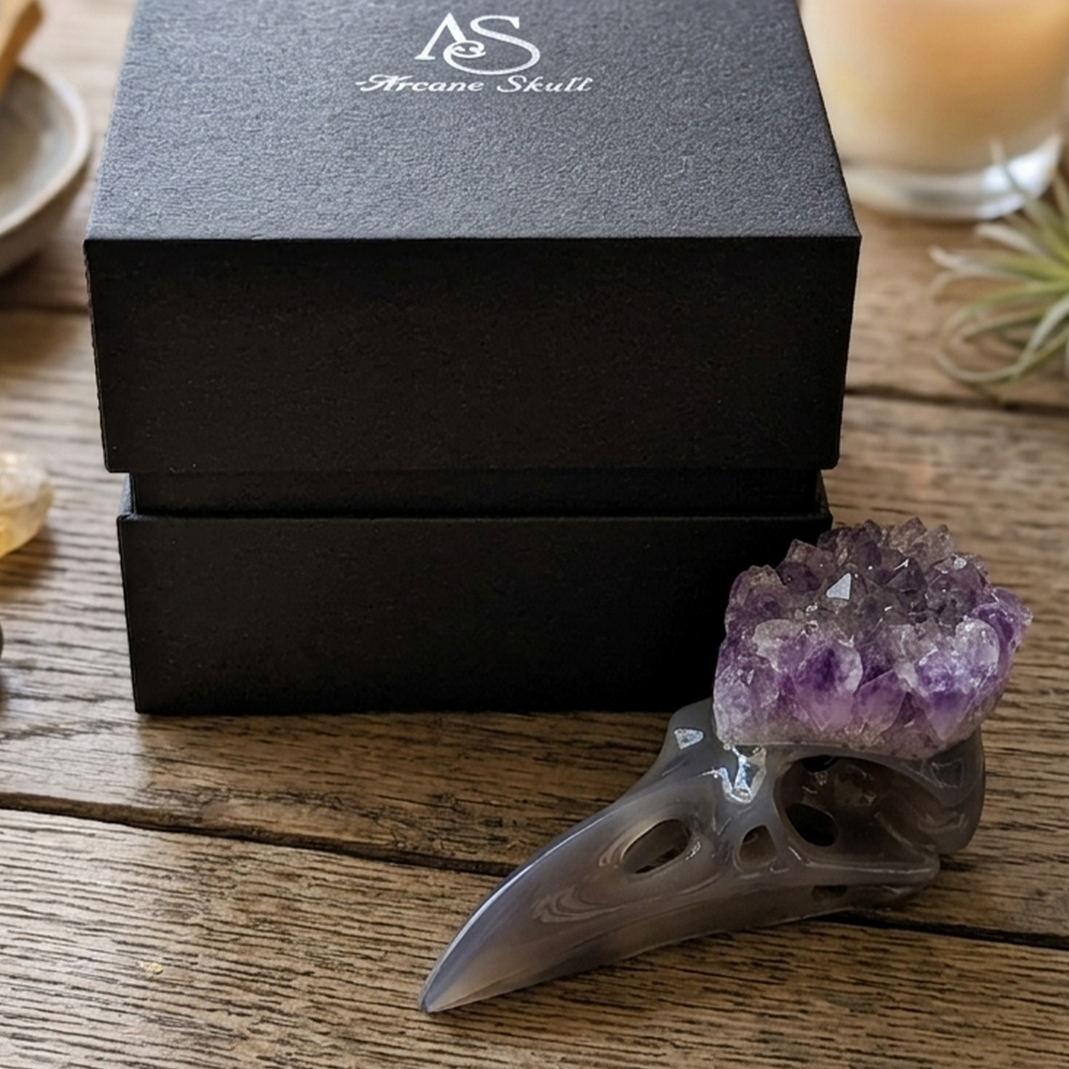 Additional view of a 3.5-inch Amethyst Cluster raven skull carving