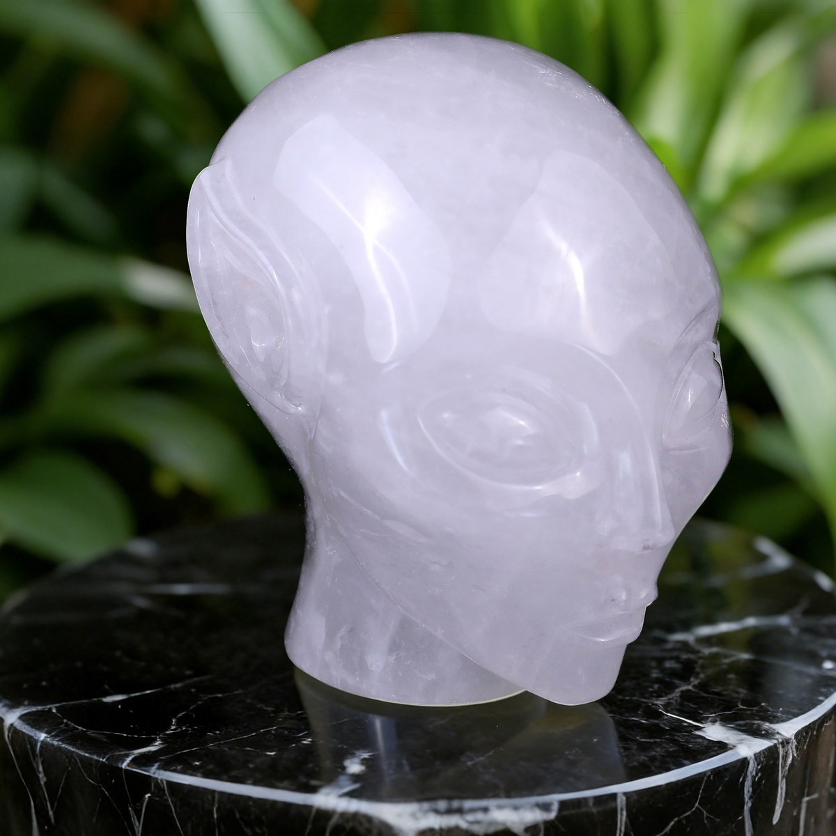 Additional view of a 3.8-inch Angola Quartz alien skull carving