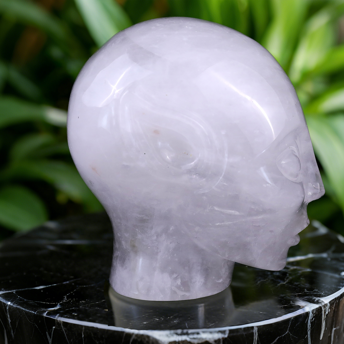 Additional view of a 3.8-inch Angola Quartz alien skull carving