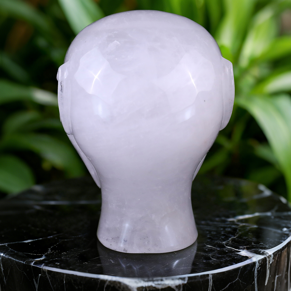 Additional view of a 3.8-inch Angola Quartz alien skull carving