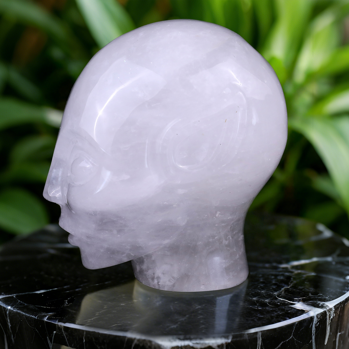 Additional view of a 3.8-inch Angola Quartz alien skull carving