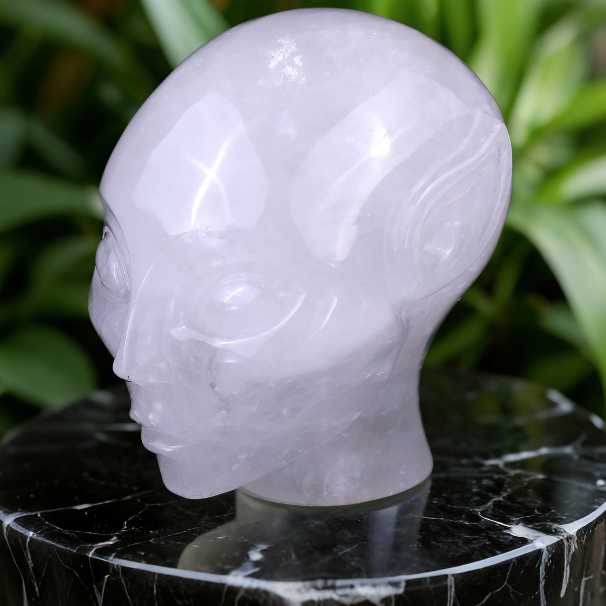Additional view of a 3.8-inch Angola Quartz alien skull carving