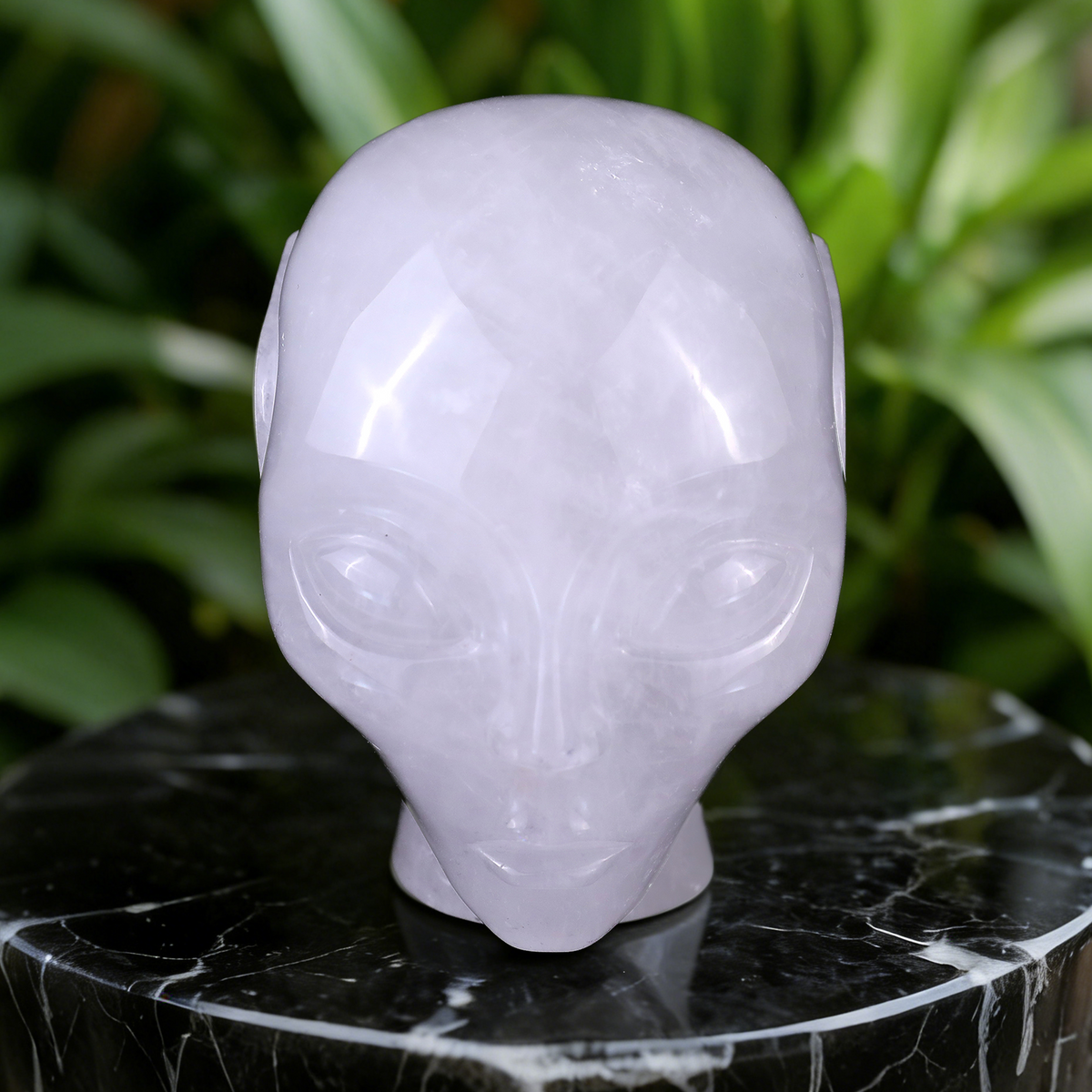 Additional view of a 3.8-inch Angola Quartz alien skull carving