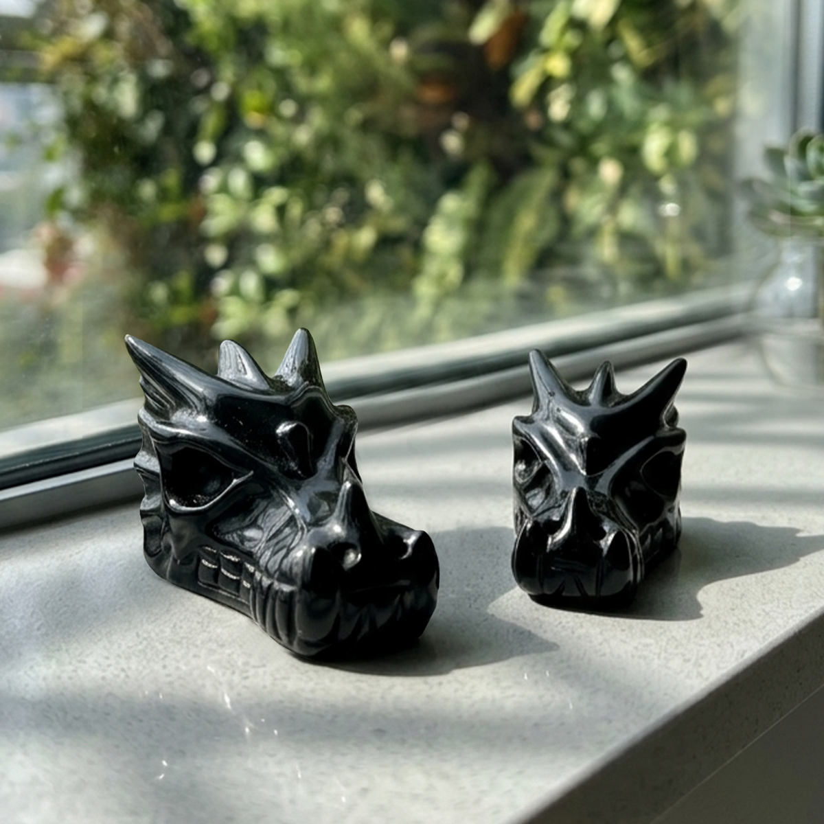 Additional view of a 2-inch Black Obsidian dragon skull carving