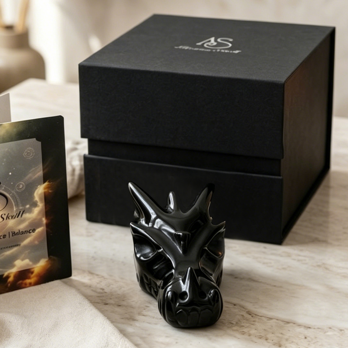 Additional view of a 3-inch Black Obsidian dragon skull carving
