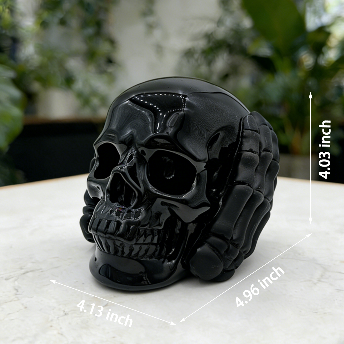 Additional view of a Black Obsidian Hear No Evil skull carving