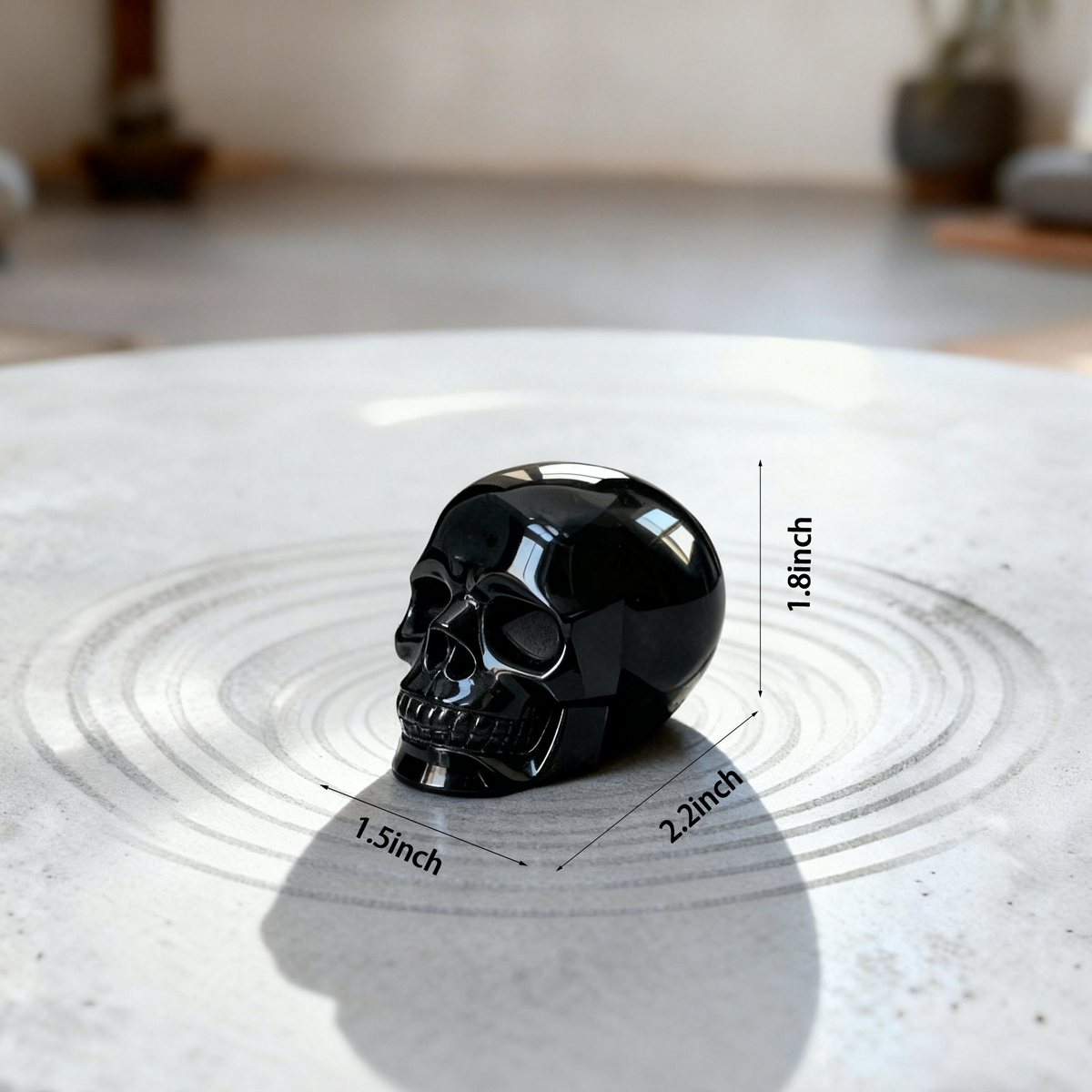 Additional view of a 2-inch Black Obsidian human skull carving