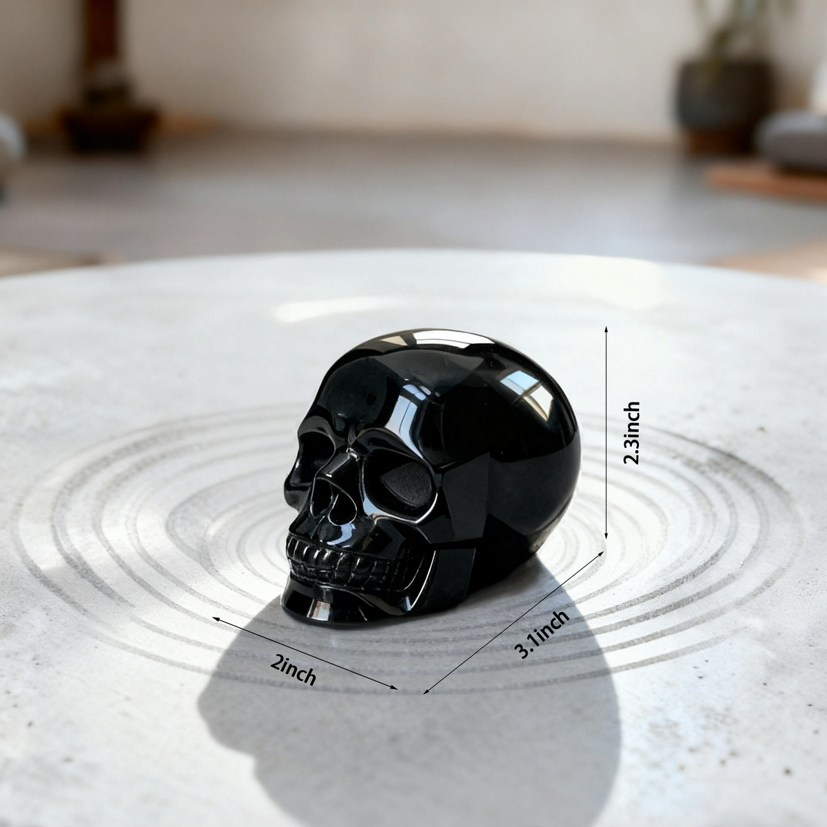 Additional view of a 3-inch Black Obsidian human skull carving