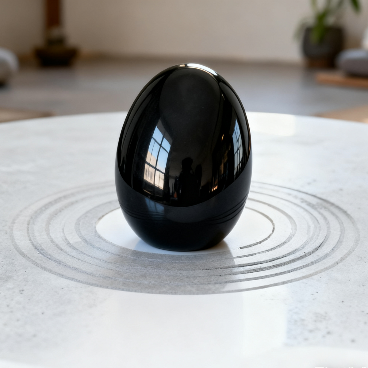 Additional view of a Black Obsidian human skull carving