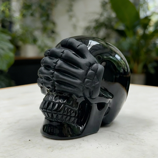 Additional view of a Black Obsidian See No Evil skull carving