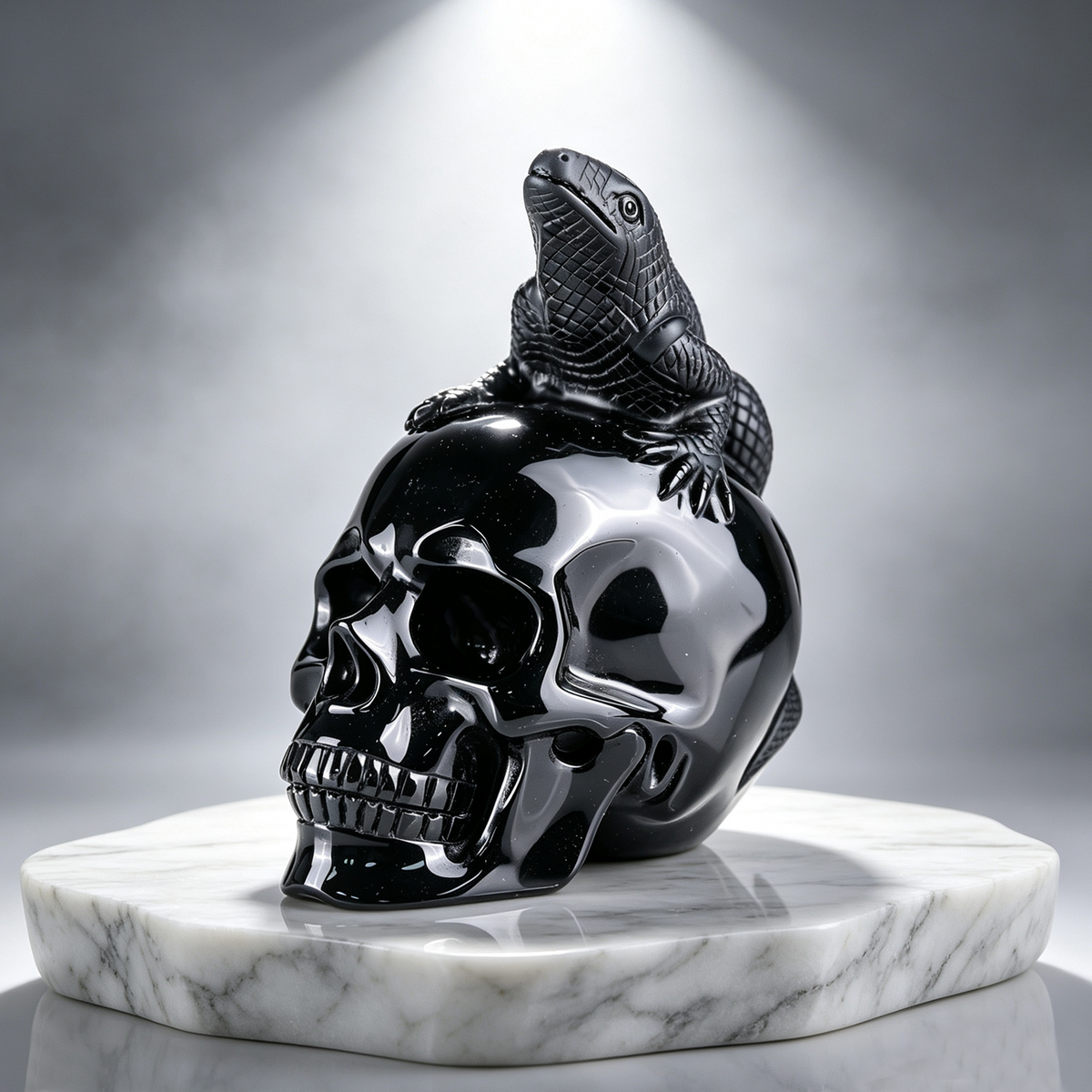 Main view of a 4-inch Black Obsidian skull and lizard sculpture