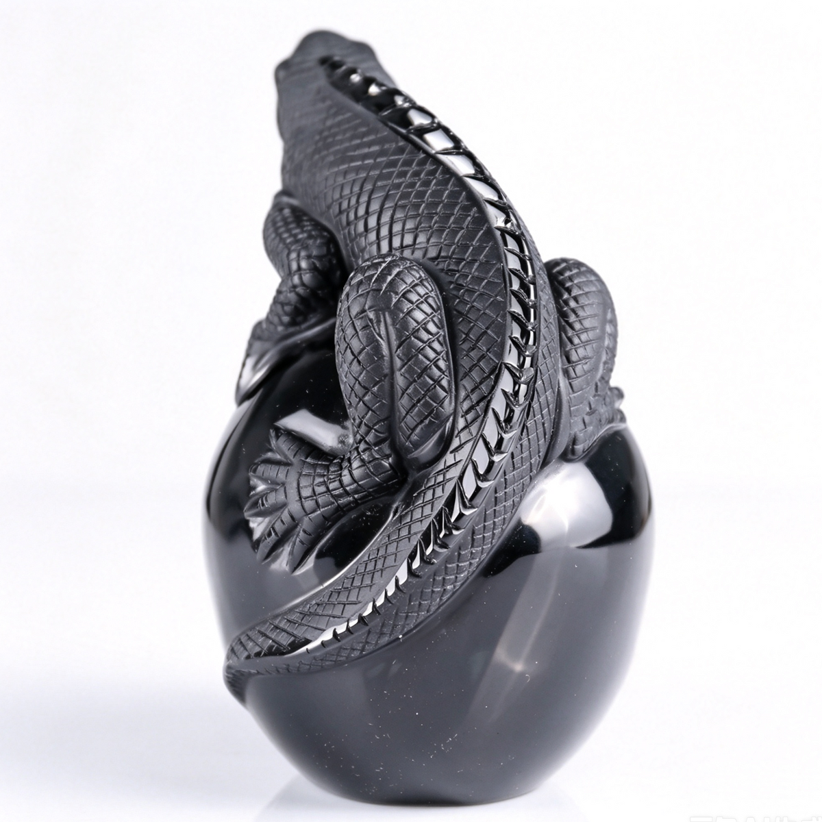 Additional view of a Black Obsidian skull and lizard sculpture