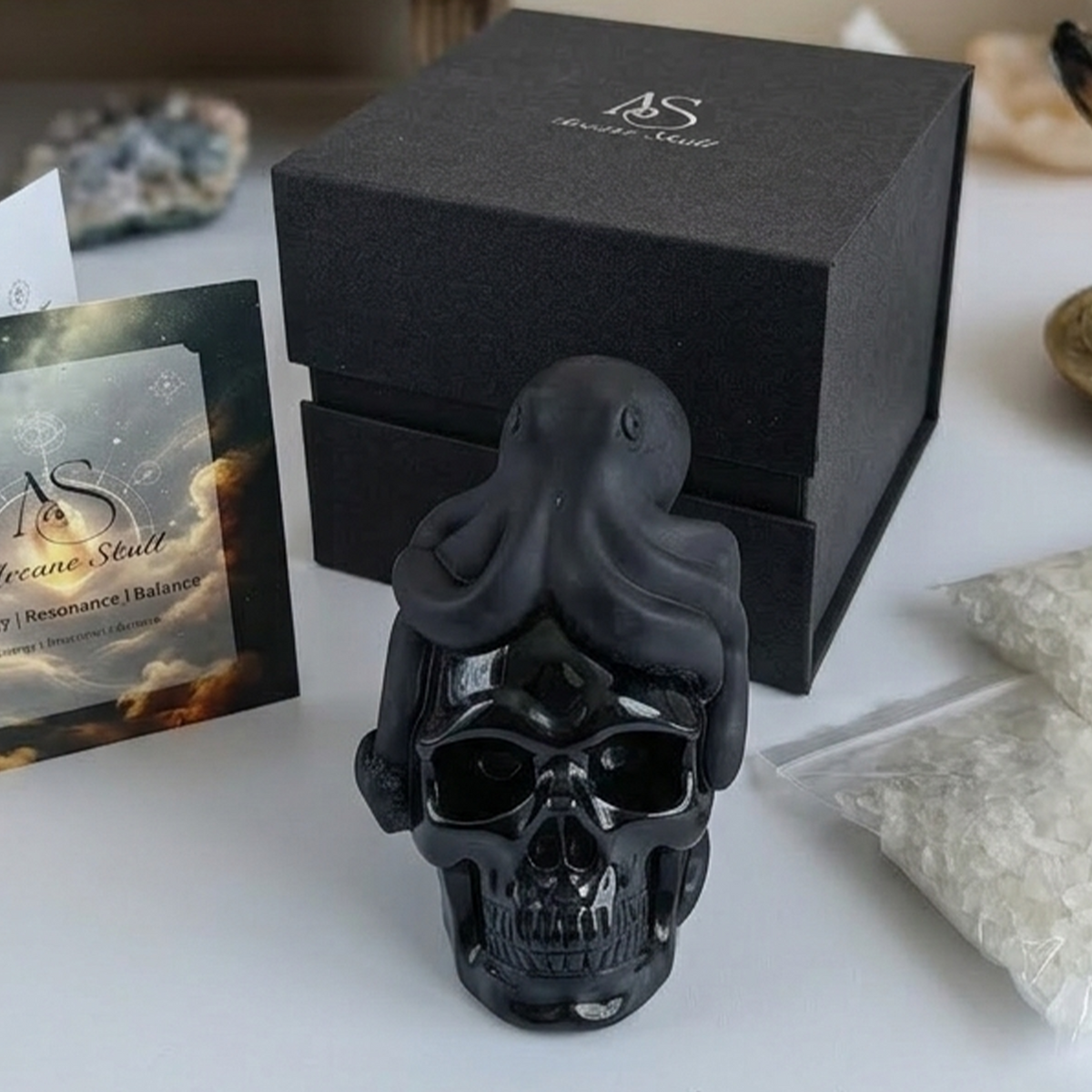 Additional view of a Black Obsidian skull and octopus sculpture