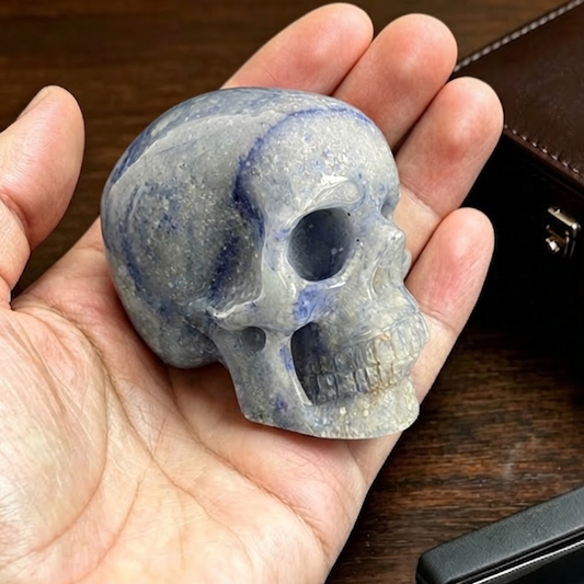 Main view of a 2-inch Blue Aventurine human skull carving