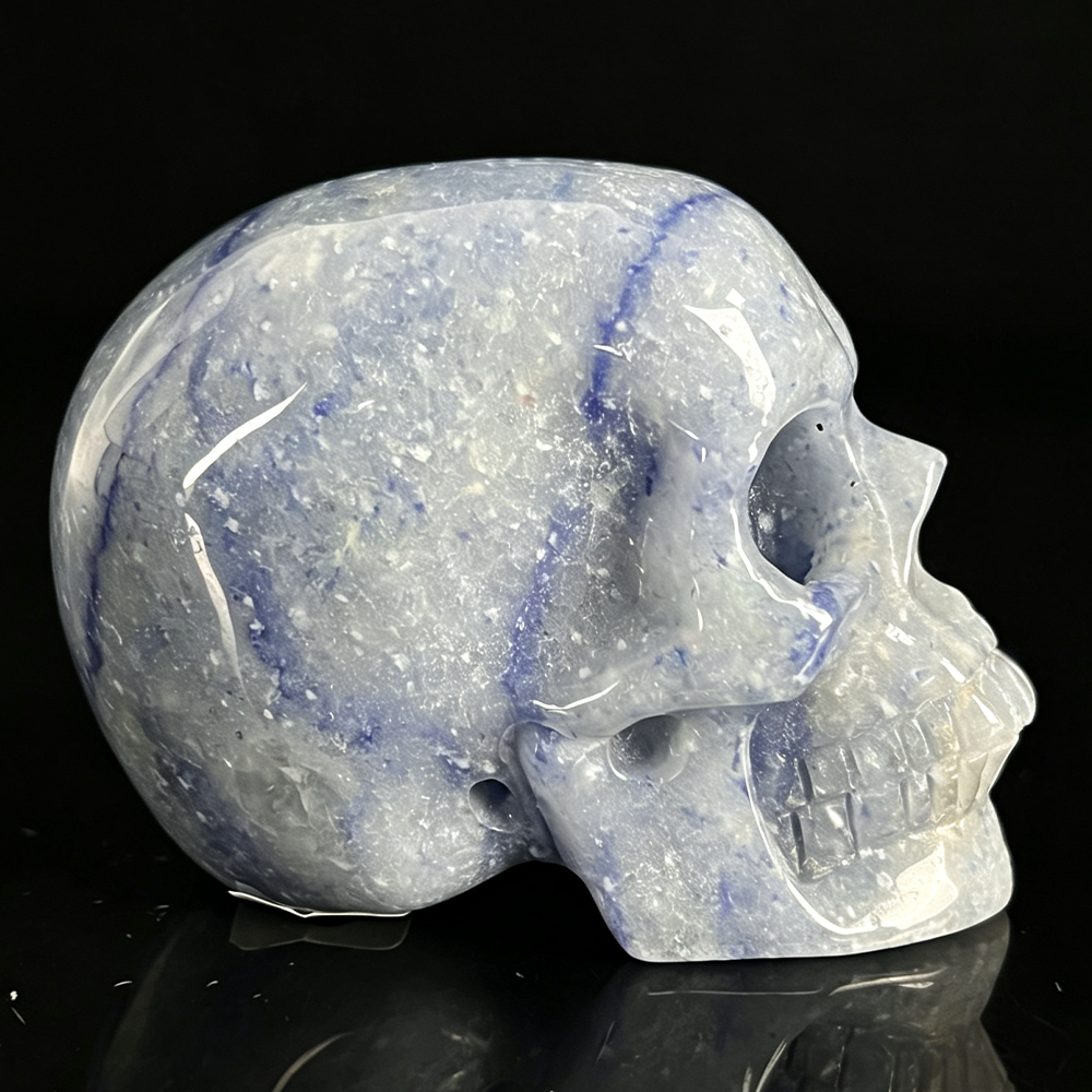 Right view of a 2-inch Blue Aventurine human skull carving