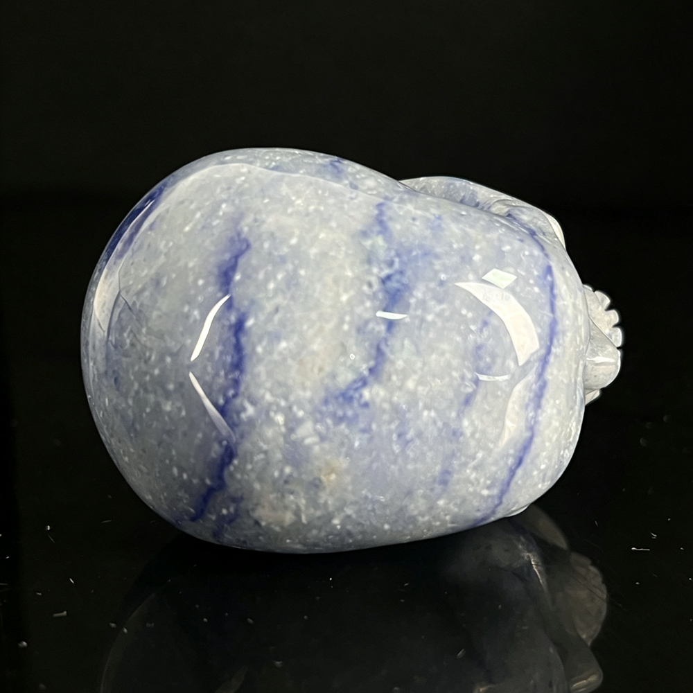 Top view of a 2-inch Blue Aventurine human skull carving