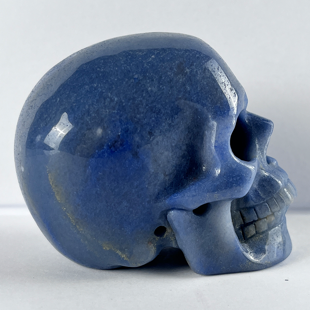 Right view of a 3-inch Blue Aventurine human skull carving
