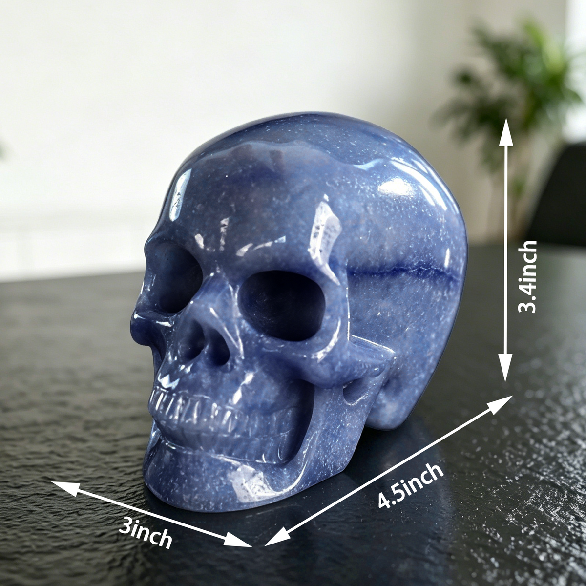 Additional view of a 4.5-inch Blue Aventurine human skull carving