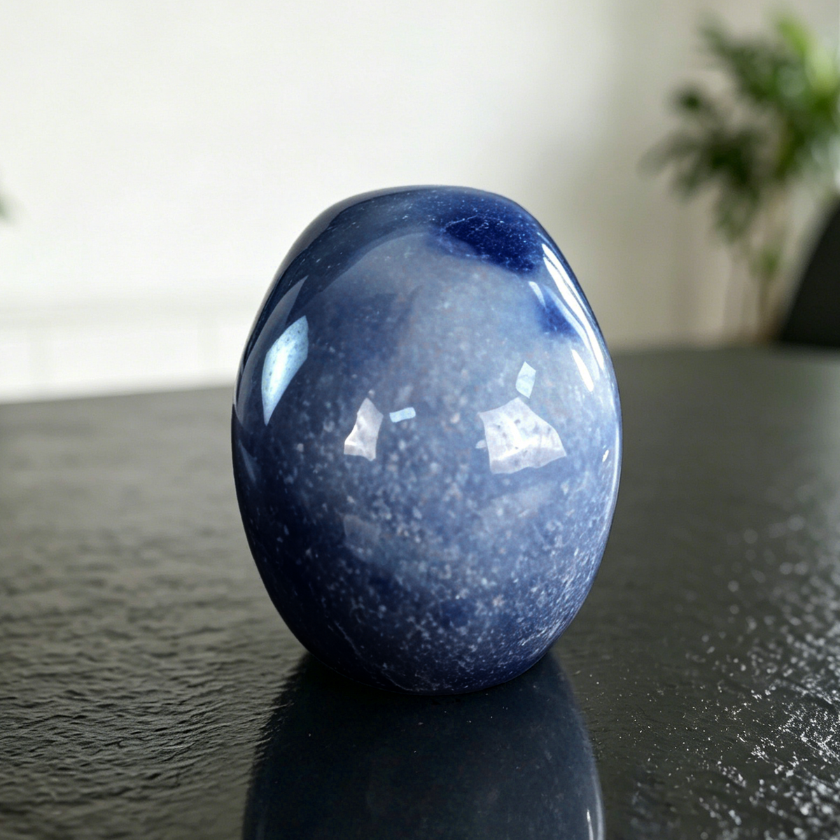 Additional view of a 4.5-inch Blue Aventurine human skull carving
