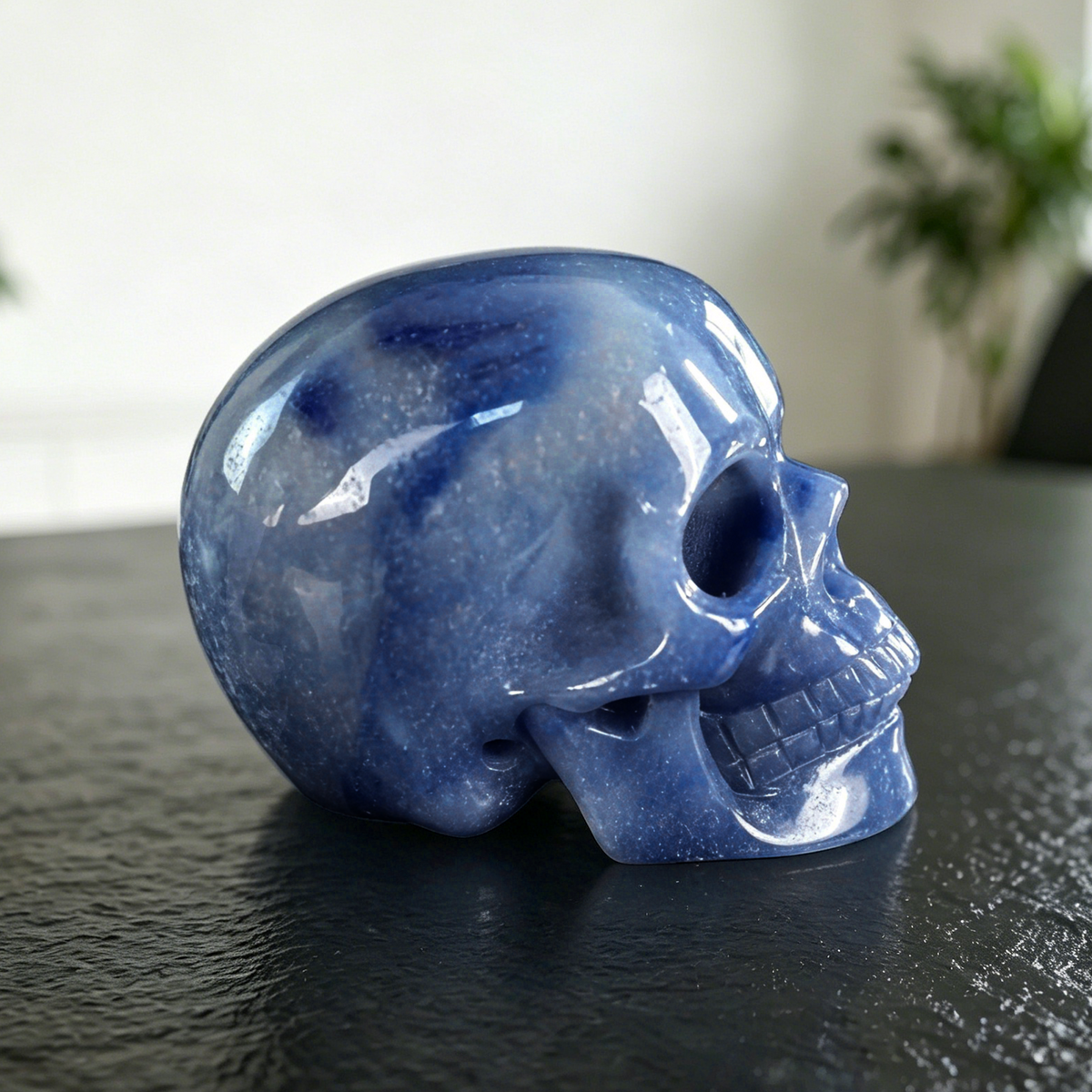 Additional view of a 4.5-inch Blue Aventurine human skull carving
