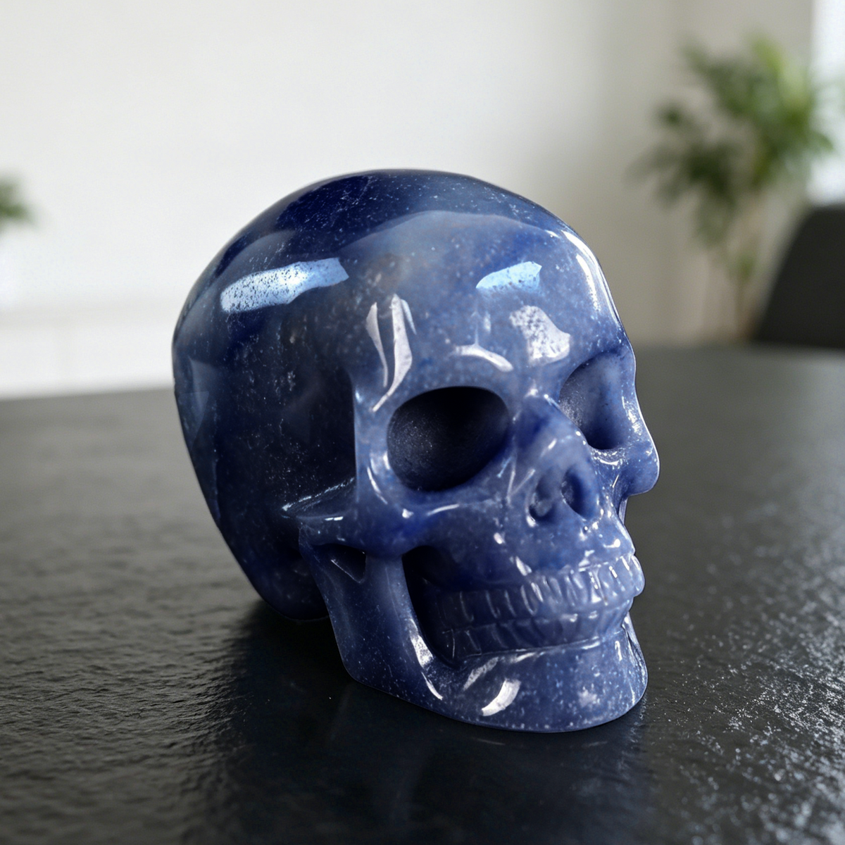 Additional view of a 4.5-inch Blue Aventurine human skull carving