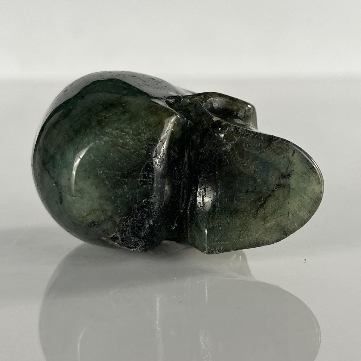 Additional view of a 2-inch Blue Labradorite human skull carving